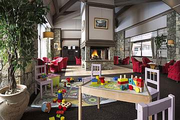 Rezidence Les Chalets de Solaise  - salonek s krbem + dětský koutek