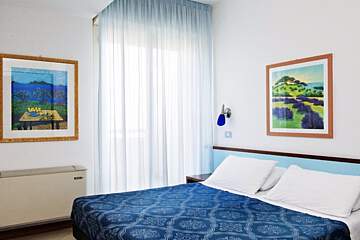 Rezidence Oltremare - Ložnice s manželskou postelí u všech typů krom studia pro 2 osoby